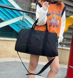 luxe mode heren dames hoogwaardige reisplunjezakken merk designer bagage handtassen sporttas met grote capaciteit 2 kleuren