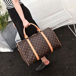 Luxe mode mannen vrouwen reistas plunjezak merk designer bagage handtassen grote capaciteit sporttassen 55CM Met slot