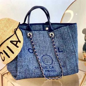 Bolsos de mano de moda de lujo para mujer Bolso bordado Bolso de playa de perlas para mujer Bolso de cadena de lona pequeño para damas grandes Bolsos de noche V13V 75% Outlet barato al por mayor