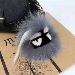 Luxe Fen Fluffy Karl Echte wasbeer Fur Pompom Monster Bags Bugs Charm Keychain Plush Key Ring Leather Tassel Pompom