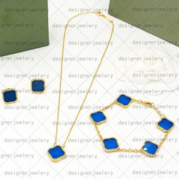 luxe quatre feuilles trèfle collier designer jewerly femmes bracelet boucle d'oreille ensemble chaîne en or fête de mariage fête des mères Saint Valentin colliers de fleurs en acier designer