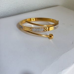 Brangle cadeau de luxe 18k bracelet en or Gold Bangle de haute qualité en acier inoxydable pas bracelet anniversaire bijoux bijoux bracelet Bracelet anniversaire boutique de style boutique