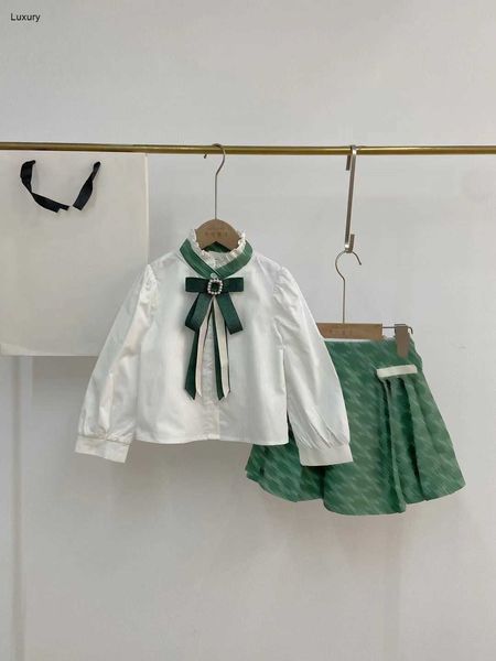 Chándales de lujo para niñas, trajes de vestir con decoración de lazo de piedras preciosas verdes para niños, talla 110-160, camisa blanca y falda con estampado completo de logotipo, Dec20