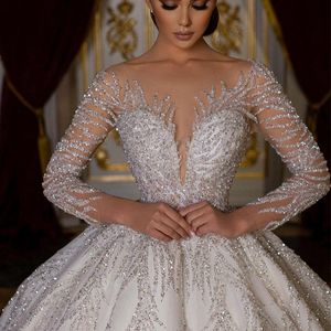 Luxe Glitter Paillettes Illusion Manches Longues Robes De Mariée 2024 Arabe Dubaï Chérie Dos Nu Robe De Bal Femmes Robes De Mariée
