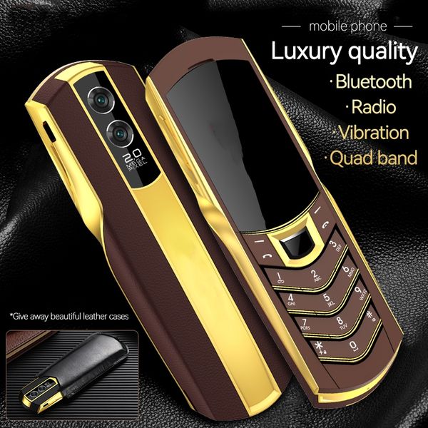 Luxury Gold Business Teléfono celular desbloqueado 2G GSM tarjeta dual sim Teléfonos móviles cuerpo de acero inoxidable Radio FM bluetooth Dial Camera Magic Voice Cellphone Free Case