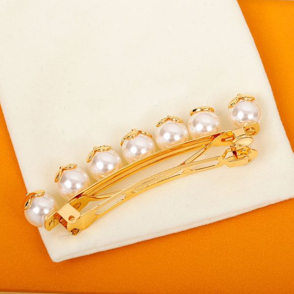 Clipt-cheveux de luxe Designer Womens Gold Pearl Hairclips Barrets décontractés Barrettes à la mode Fleur en forme de coupe de cheveux rétro ACCESSOIRES POLULATULES ACCESSOIRES DE RELAGE CAD2404091