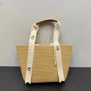 sac à main de luxe Nouveau panier de légumes d'été sac tissé en paille avec sac à bandoulière de réservoir intérieur sac à main sac sous les bras taille 30 * 23 CM trois couleurs disponibles