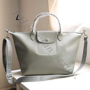 Luxury High Quality Brand épais tissu Femme Desinger Fashion Hands Sac Messager Sac de messager en cuir Sacs fourre-tout travail Travel 9xyo