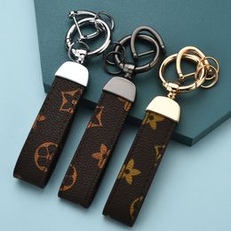 Porte-clés de luxe en cuir de haute qualité, classique et exquis, de styliste, en alliage de Zinc, lanière unisexe, cadeau, accessoires bijoux