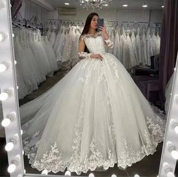Luxury Ivory Illusion à manches longues Robes de mariée 2024 Princesse en dentelle Appliques perles robes de bal robes nuptiales Vestido de Noiva