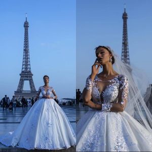 Luxe Ivoire Dentelle Robes De Mariée Robe De Bal Satin Sheer Manches Longues Illusion Retour Mariage Robes De Mariée Long Tribunal Train Dubaï Arabe