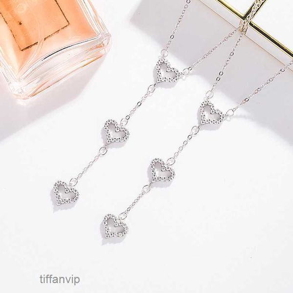 Diseñador de joyas de lujo Tiffanyitys Collares pendientes T Familia Collar de corazón Moda para mujer Versátil Ahueca hacia fuera Amor Diamante Plata de ley 925 Triple Nuevo