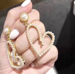 Boucle d'oreille de bijoux de luxe 2021 nouvelles boucles d'oreilles perles en forme de cœur pour femmes