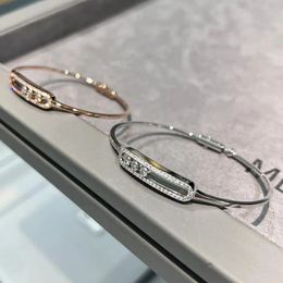 Bijoux de luxe S925 en argent sterling Bracelet de mode pour femmes Bracelet coupe brillante diamant mobile série MOVE cadeau exquis 231229