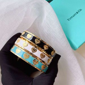 Bijoux de luxe Tiffanybracelet et co titanium acier noir blanc bleu en forme de coeur en forme de chute diamant bracelet et bracelet féminins