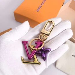 Luxury Keychain M63749 Fashion Brand Car Keychains Famous Designer Keychain Leather Round Stainless Steel for Gifts with Box Free Shipping