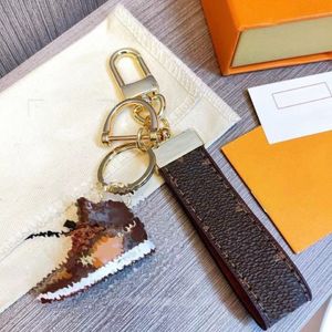 Porte-clés de luxe design unisexe porte-clés en cuir véritable avec porte-clés en acier inoxydable porte-clés pour hommes good257u