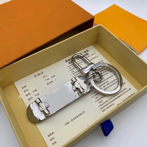 Chaîne de clés de luxe Unisexe Chain de clé en cuir réel avec porte-clés en acier inoxydable Bonne Nice 323N