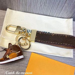 Porte-clés de luxe design unisexe porte-clés en cuir véritable avec porte-clés en acier inoxydable porte-clés pour hommes good2724