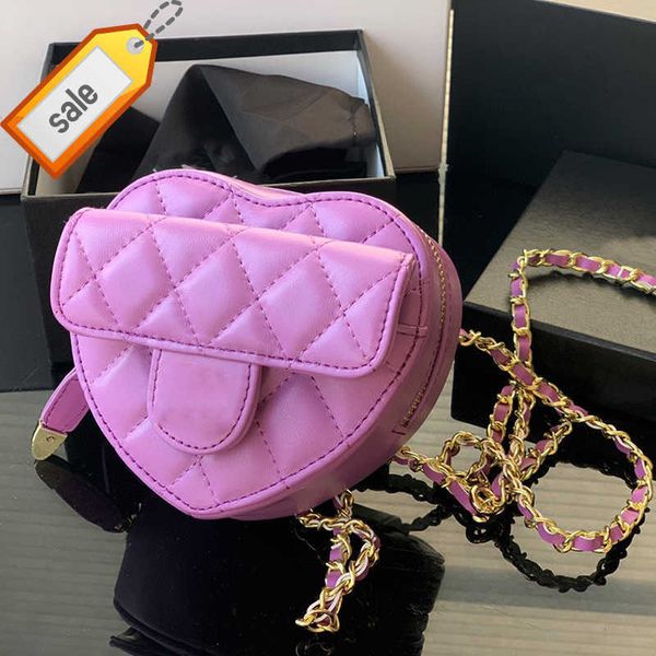 Diseñadores de marca de lujo para mujer Bolsos de hombro 2023 Moda clásica Mini piel de cordero Corazón Fanny Pack Textura Cadena de plata Bloqueo giratorio Crossbody Bolsa Venta directa de fábrica