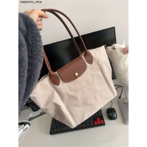 Sac à épaule de marque de créateur de cuir de luxe fourre-tout en nylon brodé en toile à main le poteau de soudure à épaule simple de grande capacité