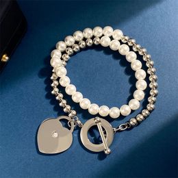 Lettre de luxe Love Heart Collier Bracelet en acier inoxydable Design OT Bouton Collier Double Perle En Acier Perle Diamant Coeur Clavicule Chaîne Bracelet Avec Boîte