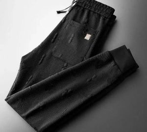 Lettre de luxe créatrice de mode imprimée Sweatpant Autumn Dernioma Big Big Pocket Harem Pant extérieur Jogger Sports Pantalons de marque
