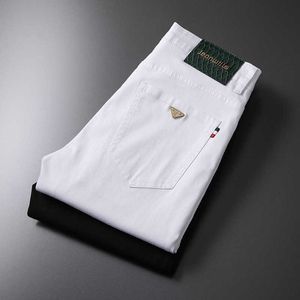 Luxe lichte witte jeans voor heren slank fit rechte been 2023 zomer dunne rek veelzijdige casual lange broek