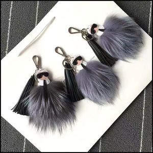 logo de luxe Moelleux Karl Véritable Fourrure De Raton Laveur Pompon Monstre Sac Bugs Charme Porte-clés En Peluche Porte-clés En Cuir Gland Pompon Mignon