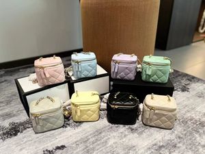 Bolso de maquillaje de lujo bolsas de bolas doradas bolsas cosméticas con piel de oveja de cuero espejo hardware versátil de oro bolso bolso de bolso