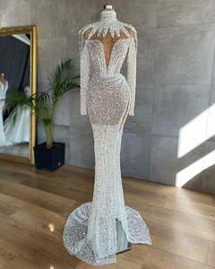 Luxe Mermaid Sparkly Prom Dresses Kralen Lovertjes Hoge Split Avondjurk Sexy Illusion Dubai Formele Partij Tweede Receptie Gown Robe de Mariée