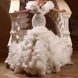 Robe de mariée sirène de luxe 2024 hors de l'épaule perles, plus la taille robes de mariée volants extra gonflés femmes robes de mariée robes de novia