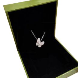 Collier de luxe Bijoux de créateurs deux colliers de pendentif papillon pour les femmes en or rose diamant rouge bule blanc coque en acier inoxydable en acier en acier inoxydable cadeau en gros