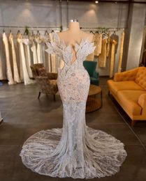 Luxury Nouvelle arrivée Robes de soirée sirène V Nou sans manches 3D Lace Lace Feuilles couvertes Fiffènes Appliques Appliques Sexy Celebrity Prom Robe plus taille de taille
