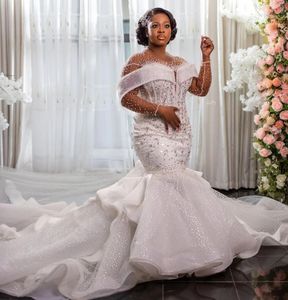 Luxe nouvelle robe de mariée sirène 2024 cristaux scintillants africains perlés pure illusion cou robes de mariée pour fille noire robes personnalisées de Novia