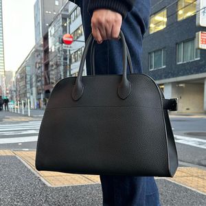 The Row Margaux Bag Margaux 17 Calidad de espejo Bolsos de mano de diseñador Bolsos cruzados de cuero de lujo Equipaje Bolso de hombro Para mujer Hombres Viajes de fin de semana Bolsa de gamuza