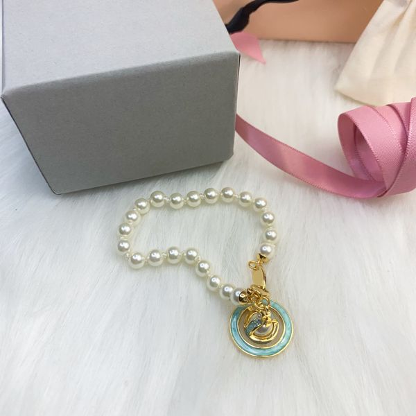 Bracelets de perles de luxe Designer Gold Saturn Pendentifs Femmes 18K Plaqué Or Charme Style Simple Bijoux Cadeaux De Fête De Mariage En Gros