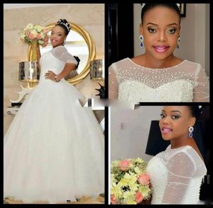 Luxe plus -size Afrikaanse trouwjurken Sheer Illusion Half Sheeves Crystal Beads Pearls 2017 Mermaid Wedding Bridal Ghowns6650161