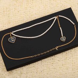 Luxe kwaliteit ketting taille riem met dubbele hart en blauw email Witte natuur parel in 18K vergulde hebben postzegelbox PS3390B