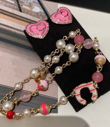 Charme de luxe Charm Choker Pendent Designer Bijoux avec des perles de perle rose et blanche Style en émail a une boîte de tampon PS3643B