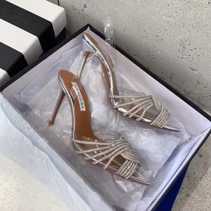 Temporada de lujo Nuevos zapatos diseñador Aquazzura Bombas Gatsby Sling 105 Sandalias de fiesta de PVC transparente Tacón de aguja Cristales Nudo Italia