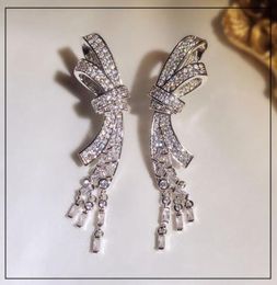 Luxe glanzende kristal zoete bowknot designer Stud -oorbellen lange tassel bengelende hanger cz diamant oorr earring oorringen feest bruiloft cadeau