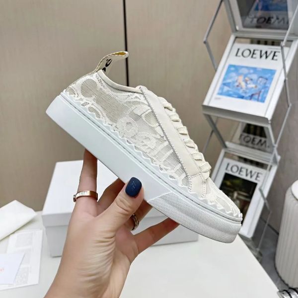 Chaussure de luxe Dames Designer Laurens Chaussures en cuir Baskets Pure White Womens Lace Casual Shoe Baskets de sport en cuir véritable Jogging Chaussures de course