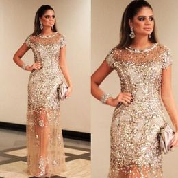 Lujo Sparkly Gold Sequined Prom Vestidos Sexy Crew Capped Sleeves See Through Champagne Formal Evening Celebrity Party Dress Dubai Gala