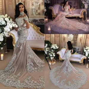 Robe de mariée sirène scintillante de luxe sexy pure perles bling dentelle appliques col haut illusion à manches longues robe de mariée trompette champagne