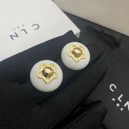 Boucles d'oreilles en or en forme d'étoile de luxe en forme de marques d'oreilles en or