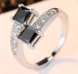 Anneaux d'étoile étoilés de luxe réels 10 kgf anneaux remplis d'or blanc pour femmes bijoux de la mode Anneau de doigt avec un véritable CZ Black Q07082339303