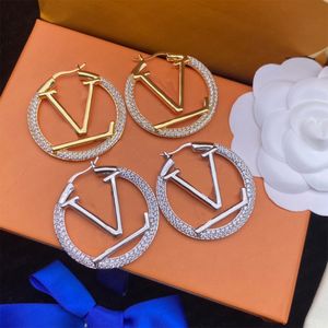 Goujons de luxe Sparkle Bright Eye Goujons en métal pour femmes Grand anneau Simple Classique Goujons de lettre Bijoux Designer de luxe Goujons de lettre
