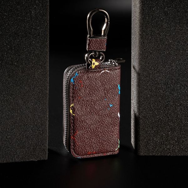 Luxury universal modelo de auto llave entrada sin llave entrada de cuero genuino entrada remota inteligente hebilla de colgante zip cargador de llave de llave unisex