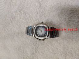 Montre de Luxe Femme N@utilus Acier Inoxydable Quartz 35.2mm Cadran Gris Fumé 7118 Montre Femme Lunette Diamant